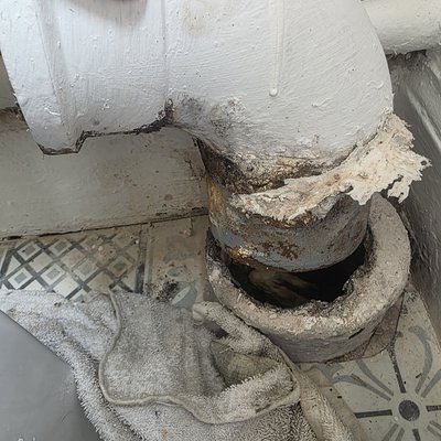 Toilet waste pipework before landlord maintenance repair