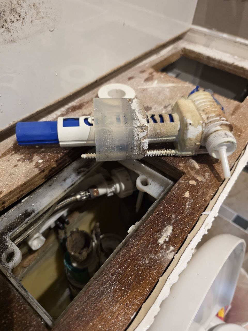Changing an inlet valve inside a concealed toilet cistern