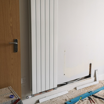 Vertical radiator installed by Matthew Beckett from Pompey Plumb Ltd