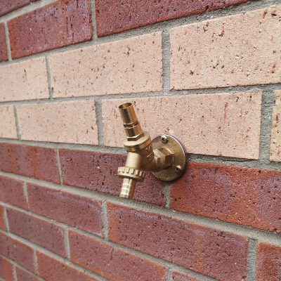 Lockshield outside tap installed by Pompey Plumb, used in shared and public areas